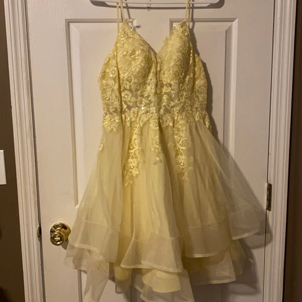 Yellow homecoming dress. Worn once. Has padding and is super pretty!